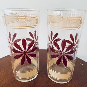 Pair of vintage mid-century glass tumblers with brown daisy and gold accents